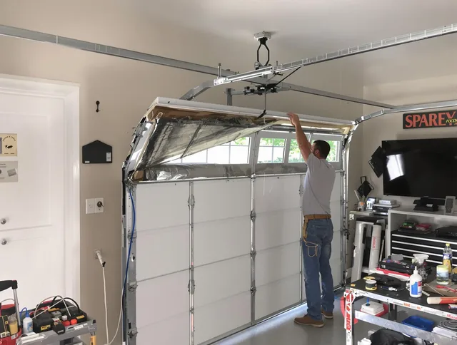 Garage door section replacement by Savannah Garage Door Repair in Savannah