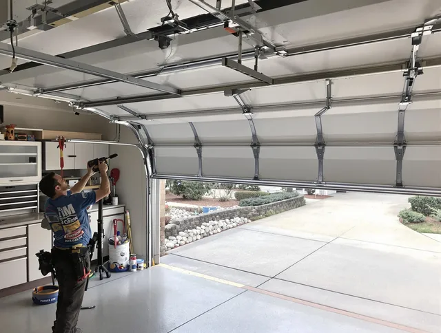Garage door track repair service by Savannah Garage Door Repair in Savannah